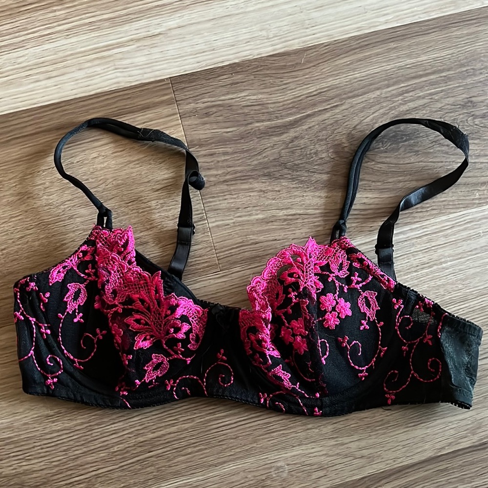 VS black and pink lace bra.
